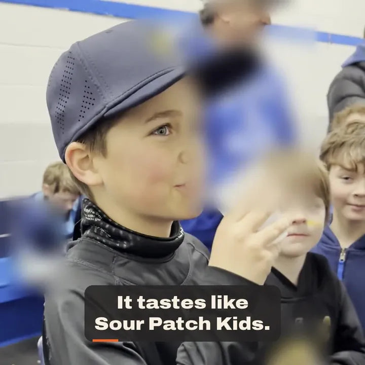 Hockey players in a locker room tasting Torrent Fruit Punch